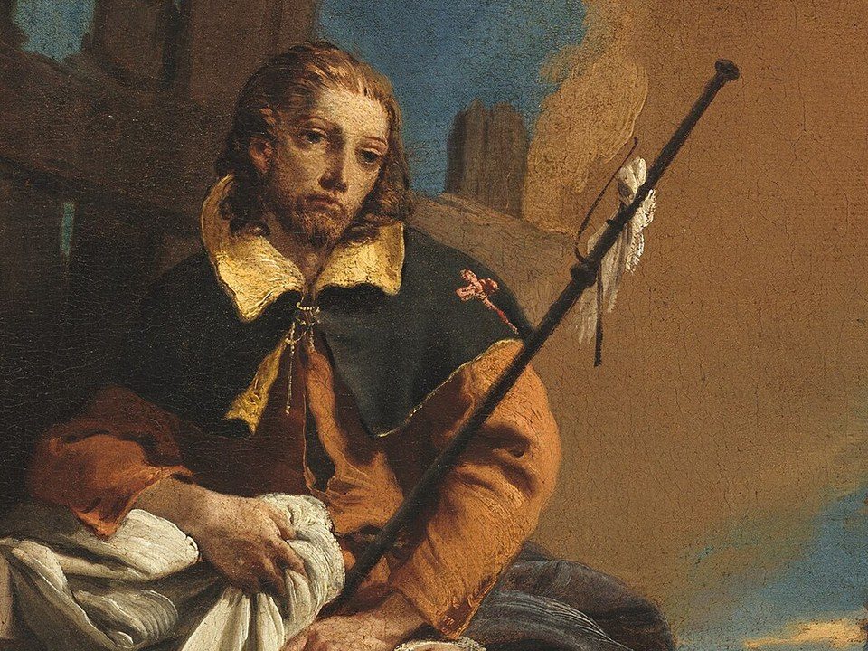 Dipinto: san Rocco seduto, con il corto mantello scuro dal colletto giallo sulle spalle e il bastone del pellegrino in mano